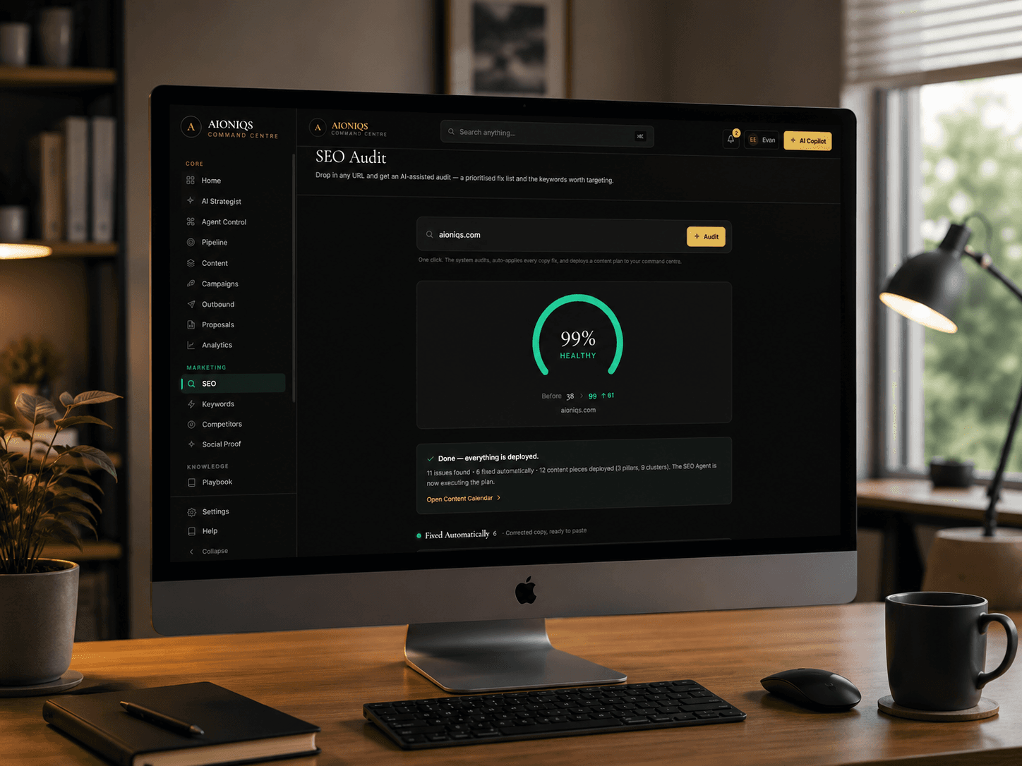 The AIONIQS Command Centre — an AI-integrated platform running an SEO audit on an iMac
